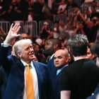 US President Donald Trump waves to the crowd as he attends UFC 314 at the Kaseya Center in Miami, Florida, on April 12, 2025. (Photo by Mandel NGAN / AFP)