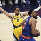 Tyrese Haliburton y Karl-Anthony Towns